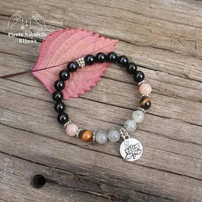 Bracelet charm lotus "Solaire" en Onyx, Pierre de soleil, œil de tigre et Labradorite