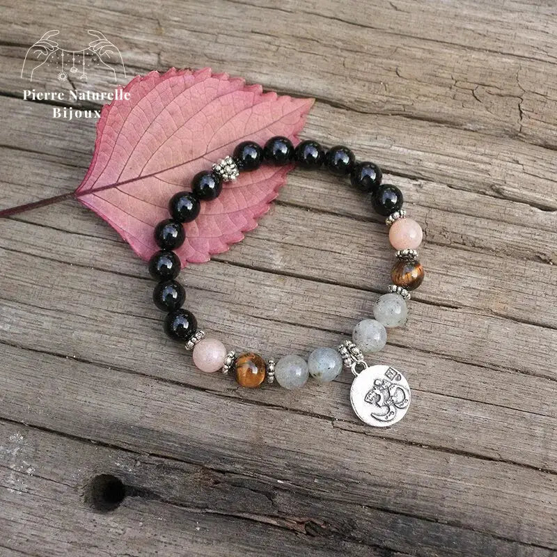 Bracelet charm om "Solaire" en Onyx, Pierre de soleil, œil de tigre et Labradorite