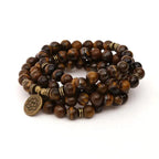 Bracelet mala œil de tigre avec charm Lotus / Om / Bouddha | Bracelets | pierre naturelle bijoux