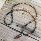 Collier "Absorption" en œil de tigre et Onyx